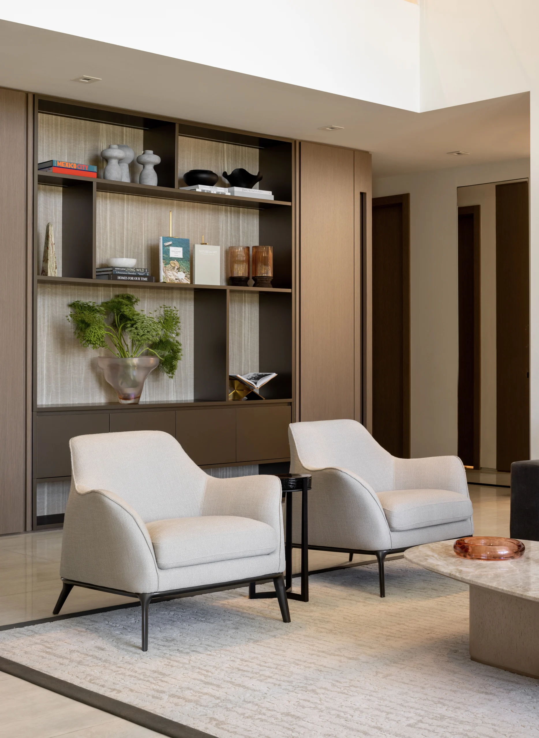 Modern house renovation in Miami with bespoke millwork, warm finishes and family-focused luxury interiors