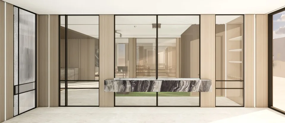 Architectural vestibule with floating marble console and steel-framed glass partitions